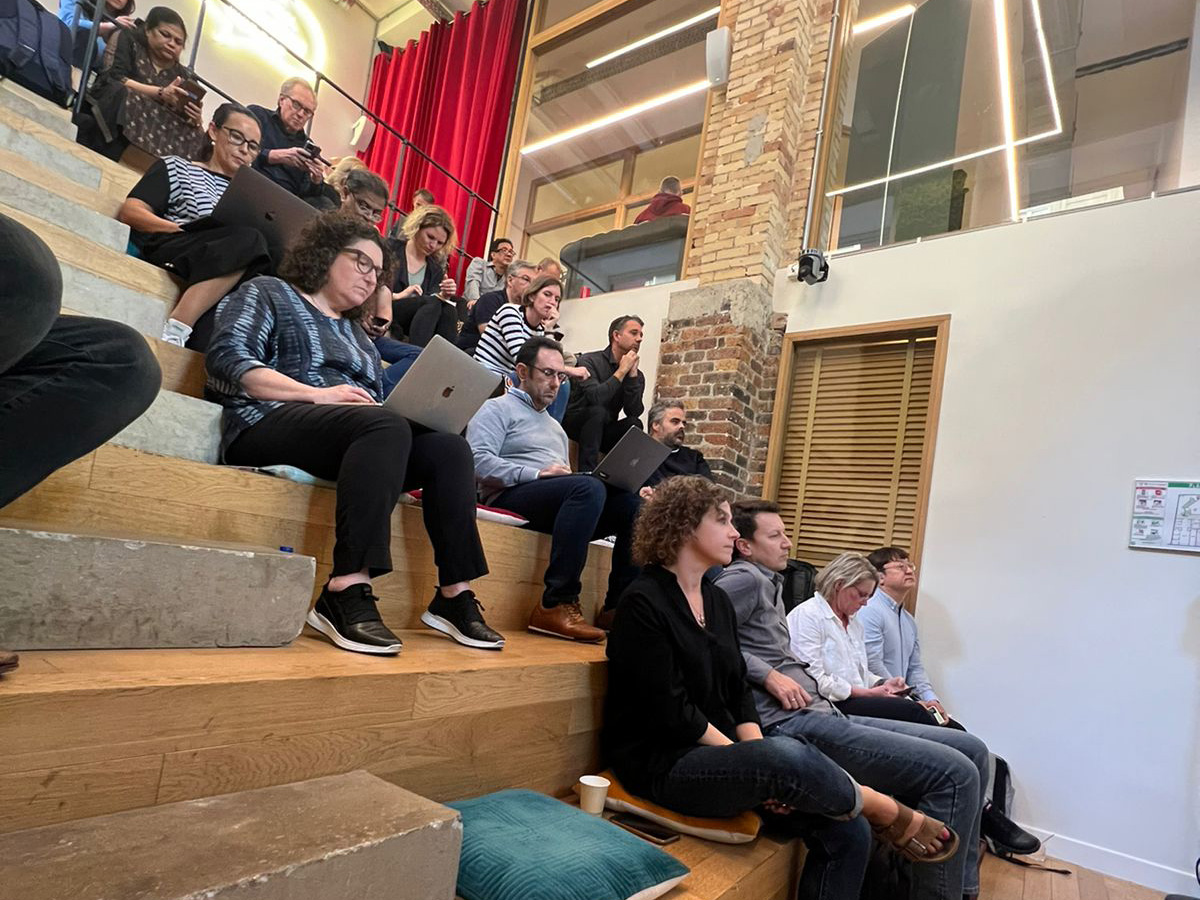 UX Masterclass conference 2022. You see global UX researchers listening to live talks on UX, CX and experience design research.